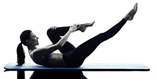 girl pulling knee to chest yoga stretch