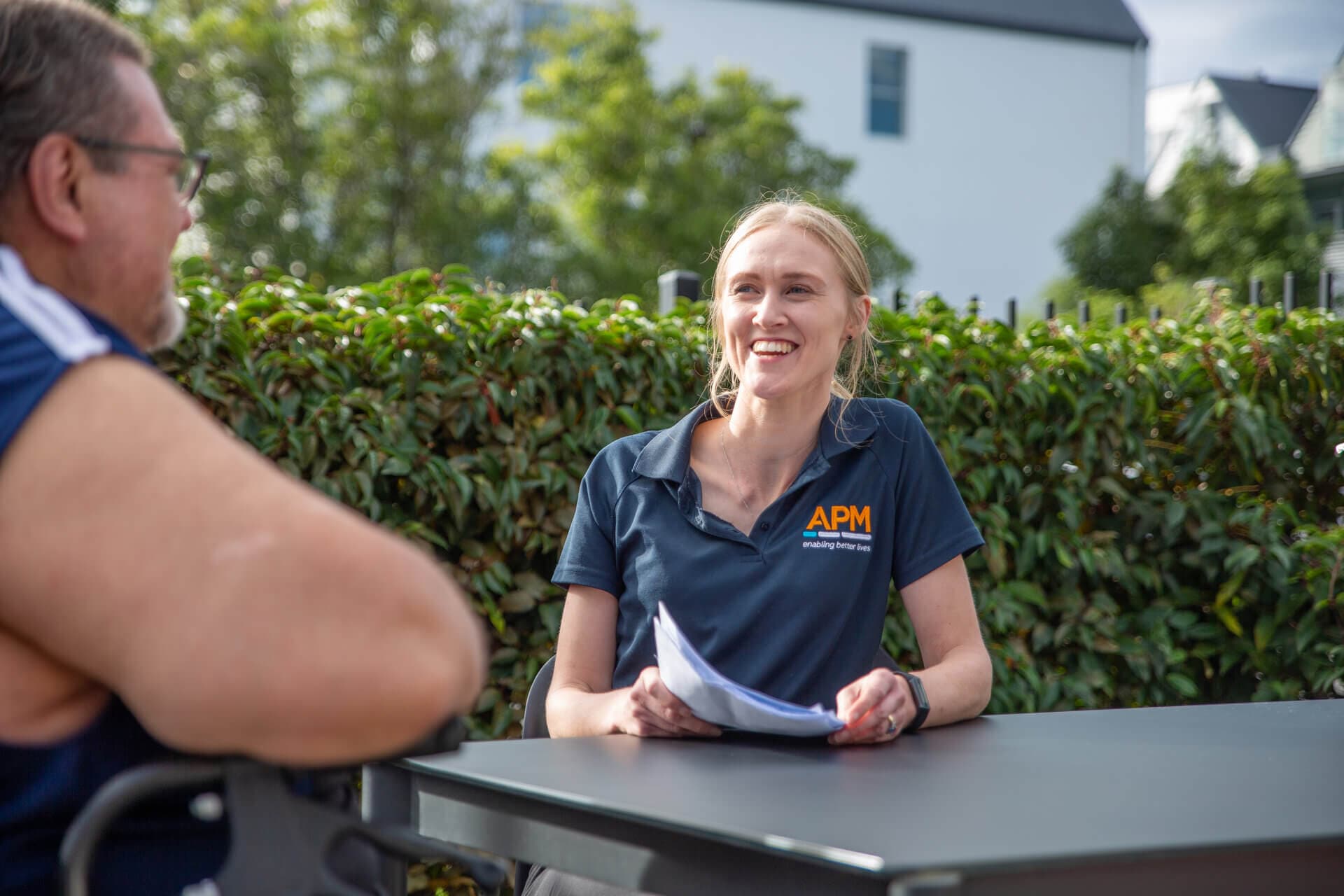APM team member smiling