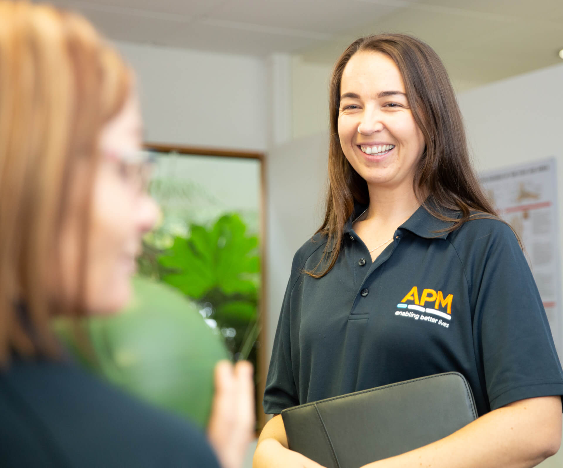 APM team member smiling