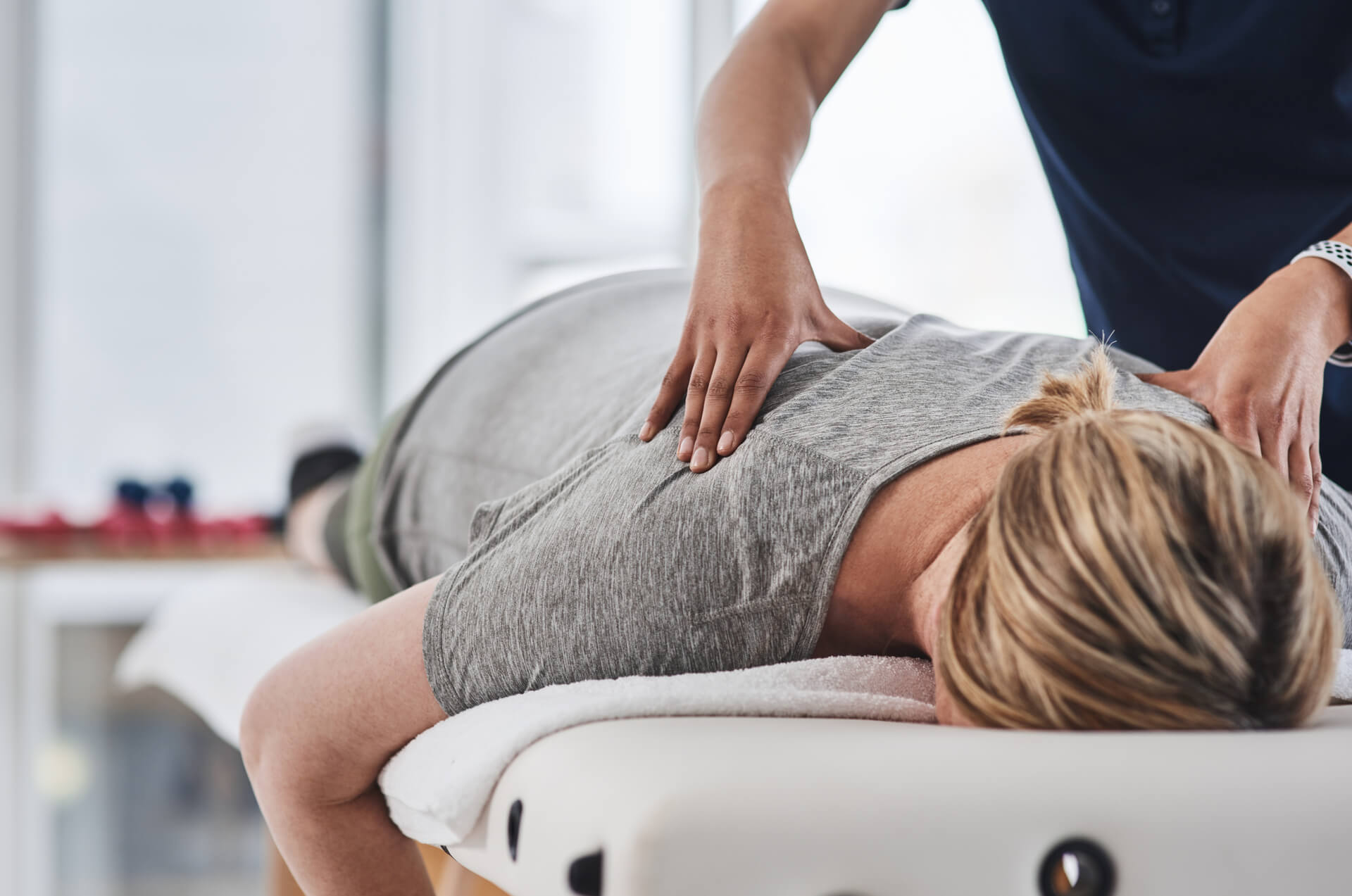 Patient receives massage from physiotherapist