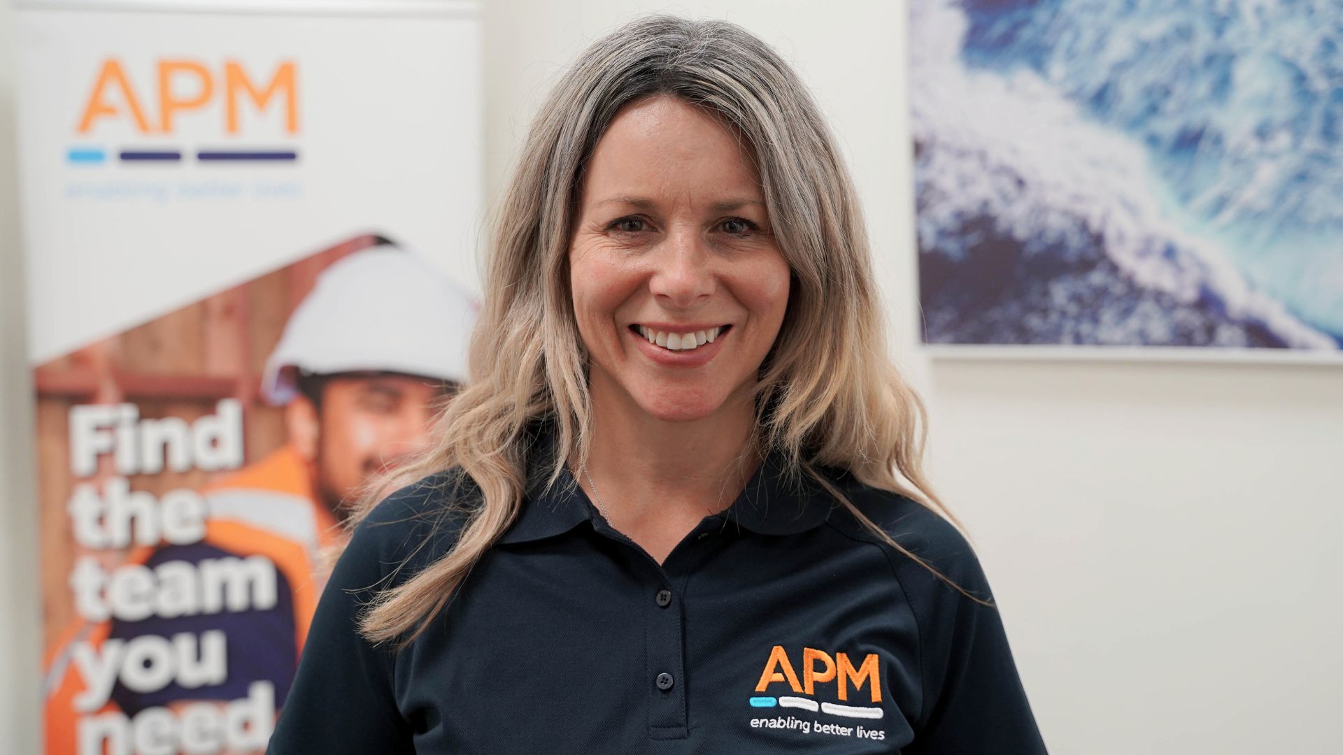 APM team member smiling